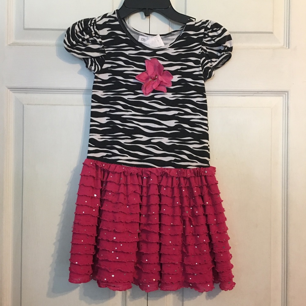Zebra print and pink dress with a flower up front